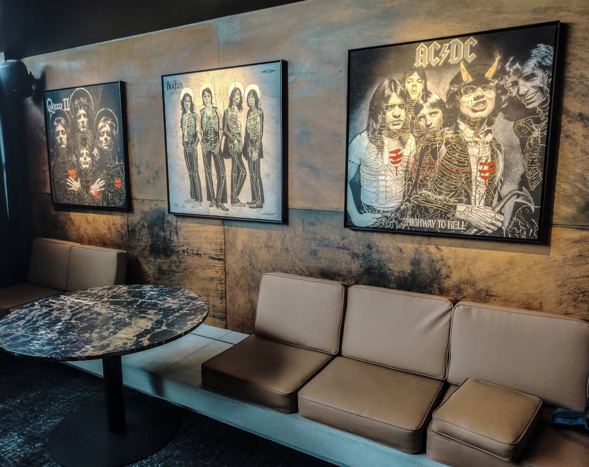 Three Carlos Olmo works installed together at Hellcity